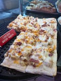 Bacon Chicken Ranch Pizza Slice