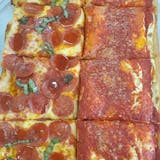 Upside Down Pizza Slice on Sicilian crust