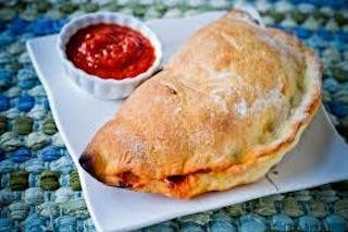 Create Your Own Calzone with Three Toppings