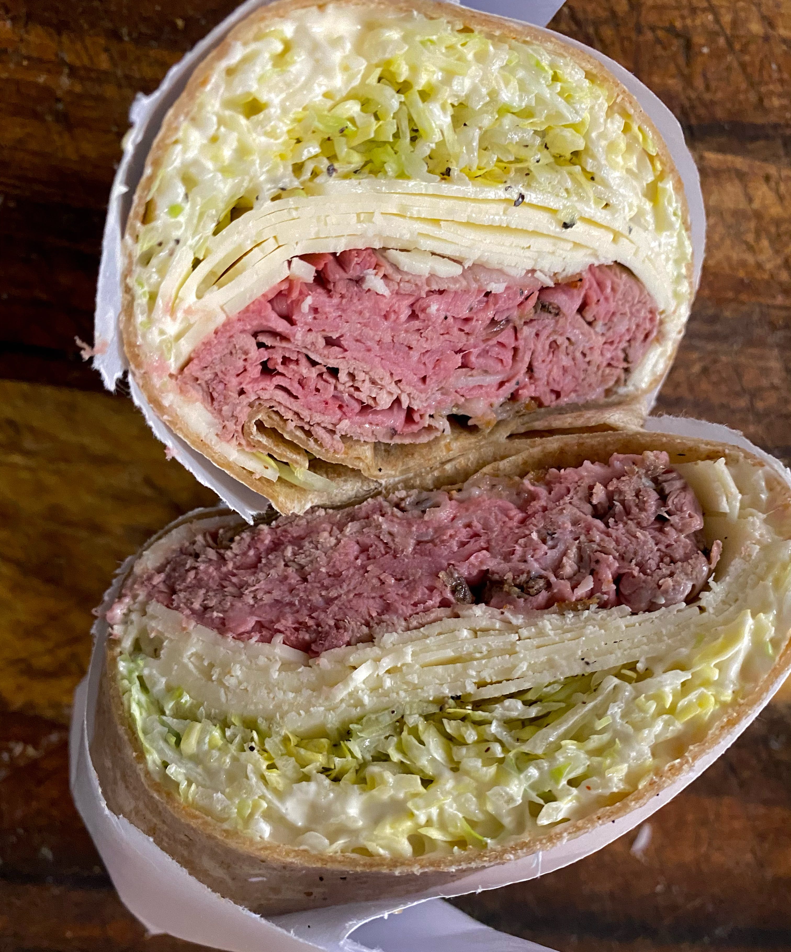 In house-roast beef, fresh mozzarella, arugula, pickled onions, horseradish or garlic aioli.