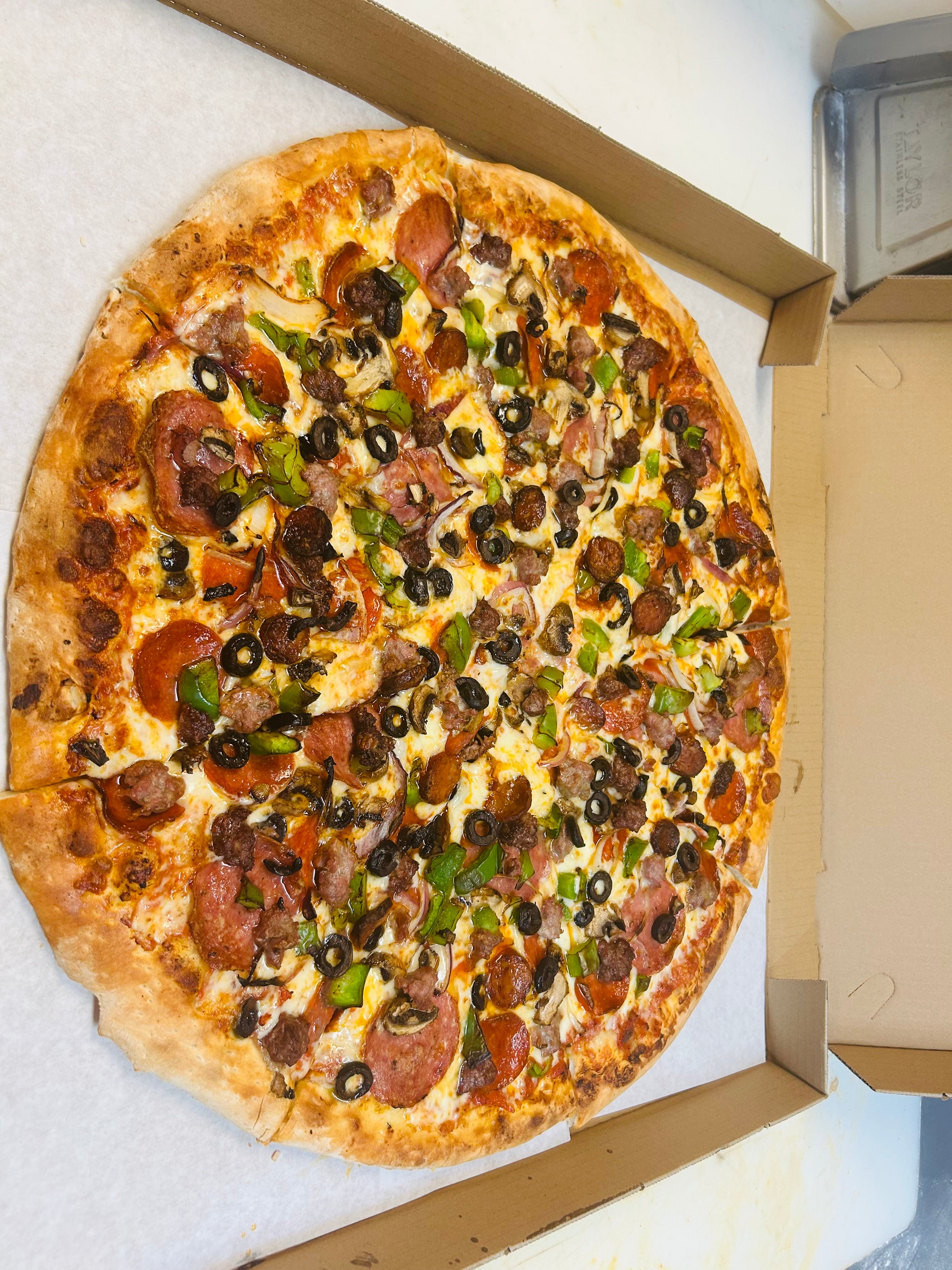 Edible Happy Pizzeria - View Menu & Order Online - 1438 Broadway