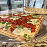 Thin Crust Cheese Pizza Slice
