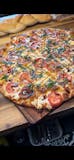 Fire-Kissed Caprese Delight Pizza