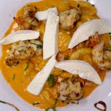 Gnocchi Topped With Fresh Mozzerella and Vodka Sauce with the choice of Chicken Or Shrimp