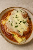 Manicotti with Sausage Parmigiana
