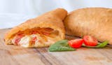 Panzerotti and can of Soda