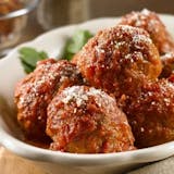 Meatballs with marinara sauce and parmesan