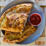 Create Your Own Calzone with Three Toppings