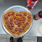 Heart shape pepperoni pizza