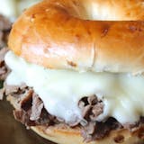 MEAT & CHEESE ON BAGEL OR ROLL