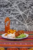 Pollo con papas Fritas