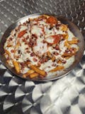 Seasoned French Fries Topped with mozzarella cheese, bacon, and pepperoni