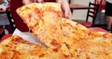 Two 1-Topping Pizza Slices & Drink Lunch Special