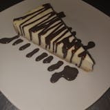 Cheesecake With Chocolate Drizzle