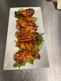 Wings.   choice.   Buffalo hot sauce.  Or washington style Mambo sauce