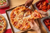 Free 6 Wings with the Purchase of any 2 Large Pizzas