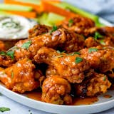Free Full Order of Salad with The Purchase of 13 Wings