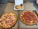 2 large 2 topping pizzas and 8 breadsticks