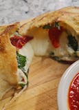 Spinach and Sundried Tomato Calzone