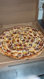 Any Medium Hand Tossed Specialty Pizza