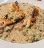 Risotto with porcini, peas and shrimp