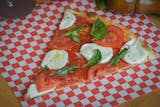 Slice of Caprese Pizza