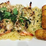 Stuffed Shrimp with Crab meat over Spaghetti