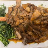 Veal Chop breaded with Portbello Mushrooms