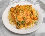 Pasta with Shrimp, Spinach & Tomato in a Cream Sauce
