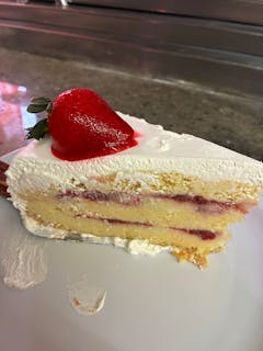 Tres leches cake with strawberry filling