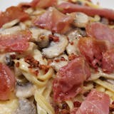 Pasta with mushrooms ,prosciutto & bacon