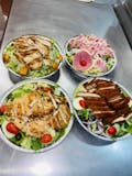 Breaded Chicken over Salad