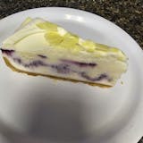 Blueberry Cobbler White Chocolate Cheesecake