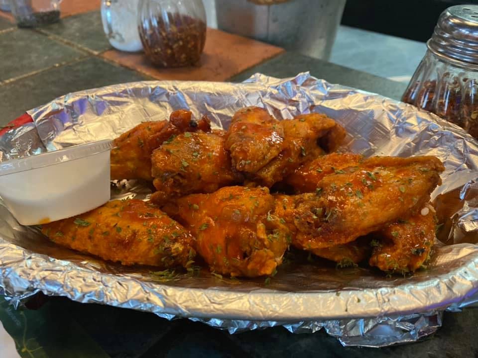 Order Cap's Wings - 10 WINGS food online from Cap's Pizza store, Vero Beach on bringmethat.com