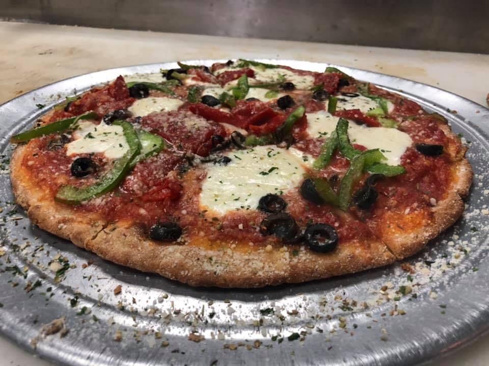 Order Veggie Pizza - Medium 14" food online from Cap's Pizza store, Vero Beach on bringmethat.com