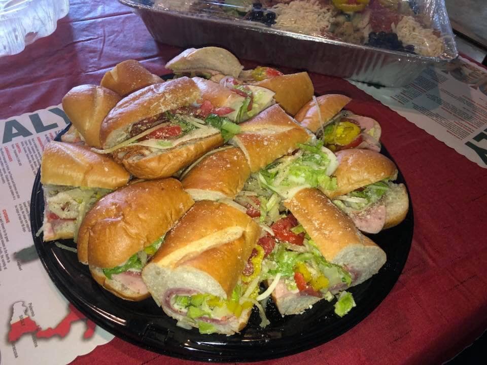 Order Italian Sub - Large food online from Cap's Pizza store, Vero Beach on bringmethat.com