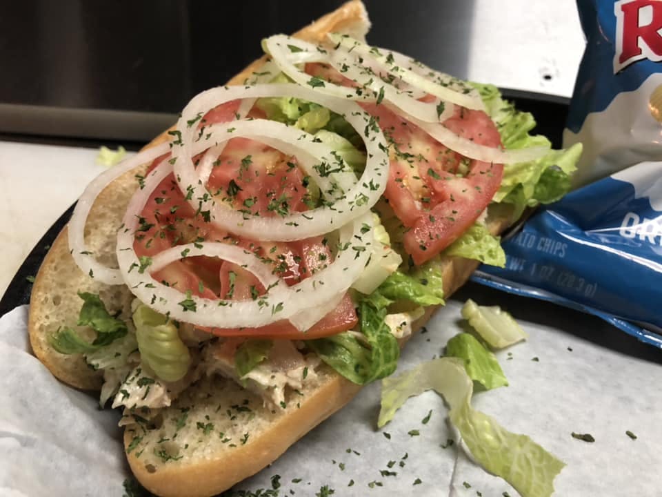 Order Tuna Salad Sub - Large food online from Cap's Pizza store, Vero Beach on bringmethat.com