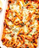 Baked ziti (5-6 people), includes salad, bread, and choice of dessert.