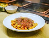 Rigatoni in a Traditional Bolognese Meatsauce with Peas