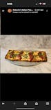 Famous Grandma Pizza Slice