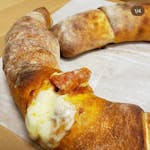 Sausage, Pepperoni & Mozzarella Stromboli