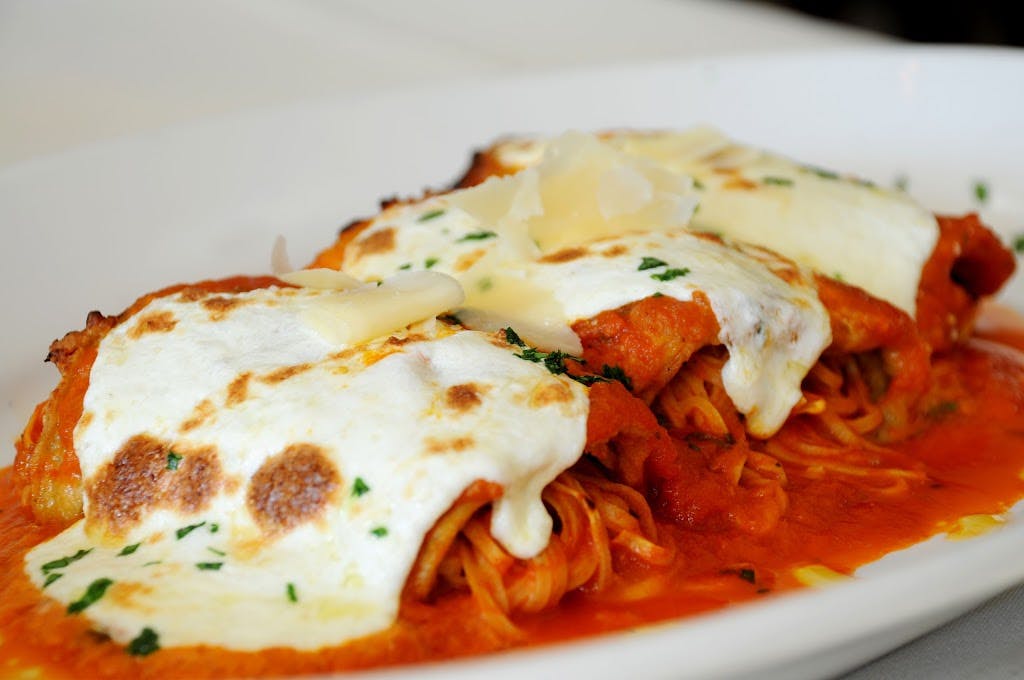 Order Manicotti - Pasta food online from Grandes Bella Cucina store, Palm Beach Gardens on bringmethat.com