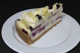 Blueberry Cobbler White Chocolate Cheesecake Slice