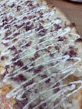 Chicken Bacon Ranch on White Pizza Slice