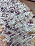 Chicken Bacon Ranch on White Pizza Slice