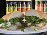 Grilled Chicken Bun with arugula, pesto, and fresh mozzarella
