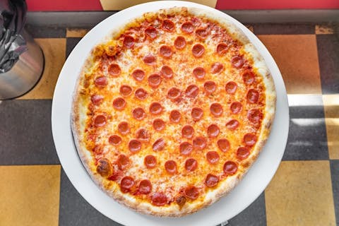 Stella's Pizza - View Menu & Order Online - 110 9th Ave, New York
