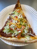 Taco pizza slice