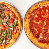 2 Medium Pizza, garlic knots, soda Special