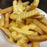 Crinkle Cut French Fries with Cheese Sauce